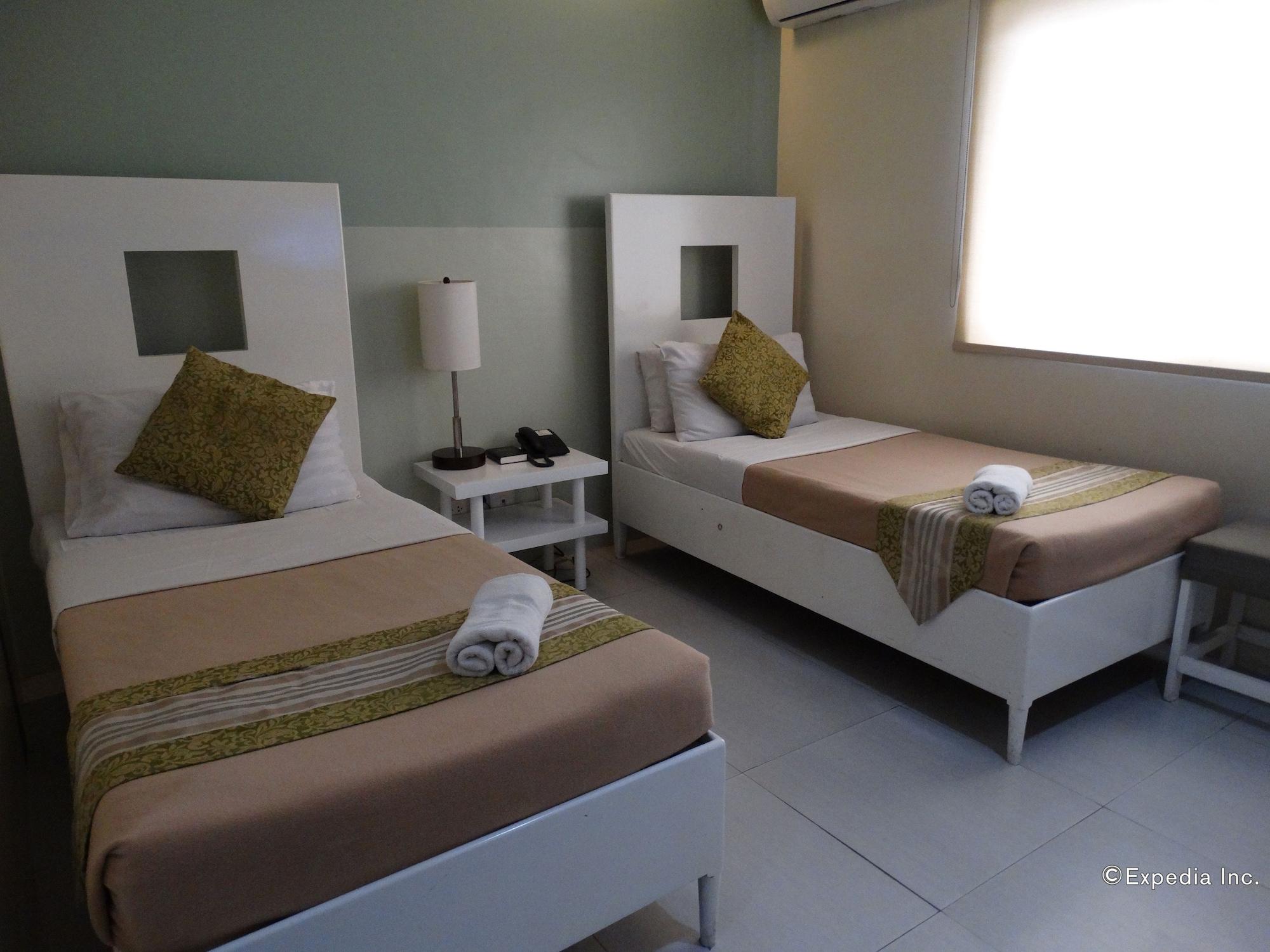 Empire Suites Hotel Puerto Princesa Luaran gambar
