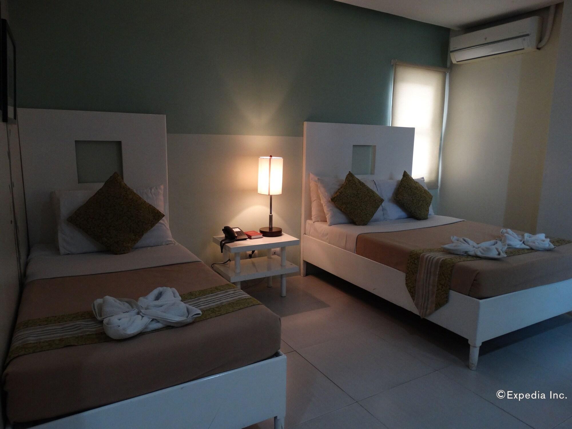 Empire Suites Hotel Puerto Princesa Luaran gambar
