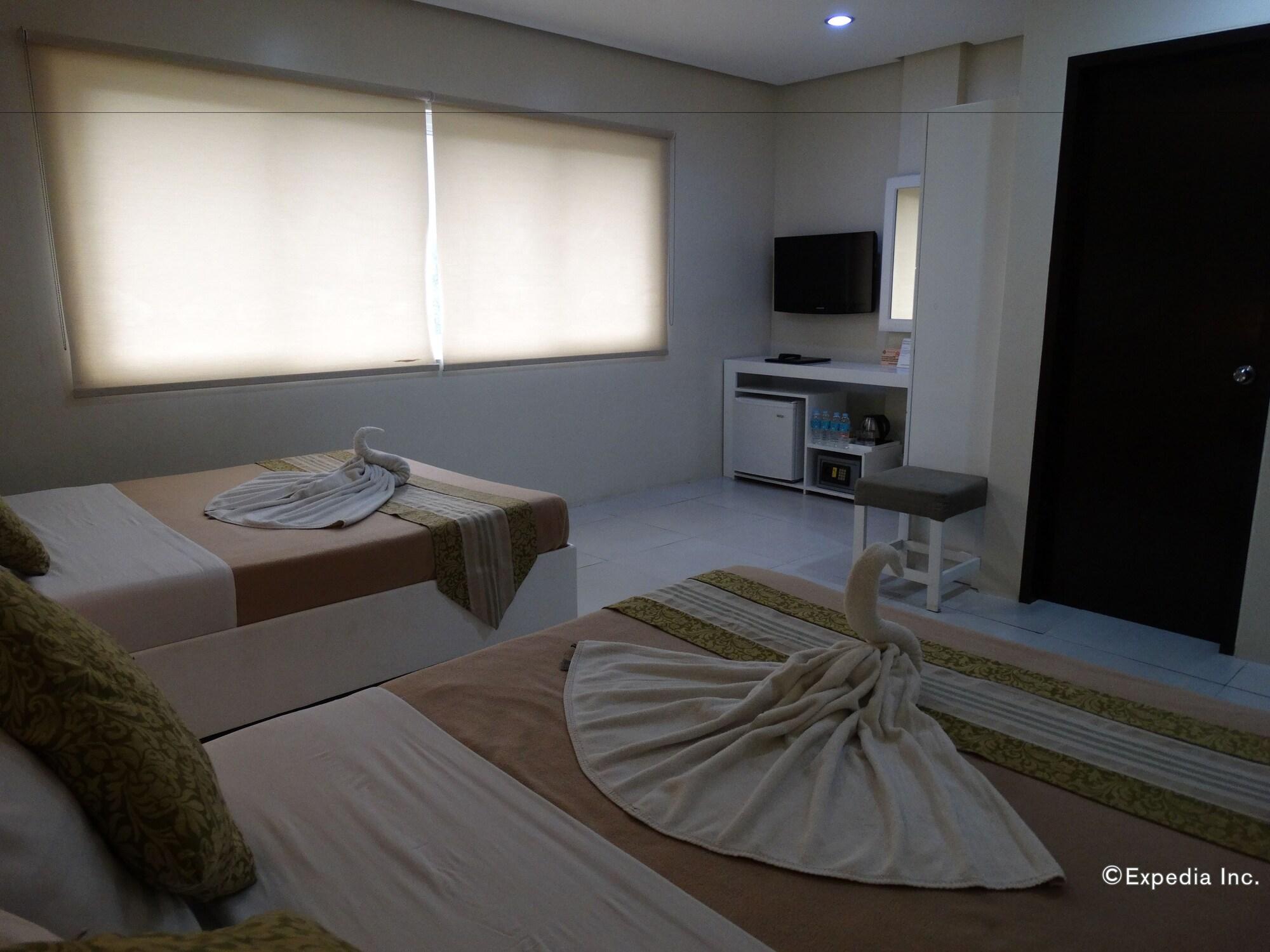 Empire Suites Hotel Puerto Princesa Luaran gambar