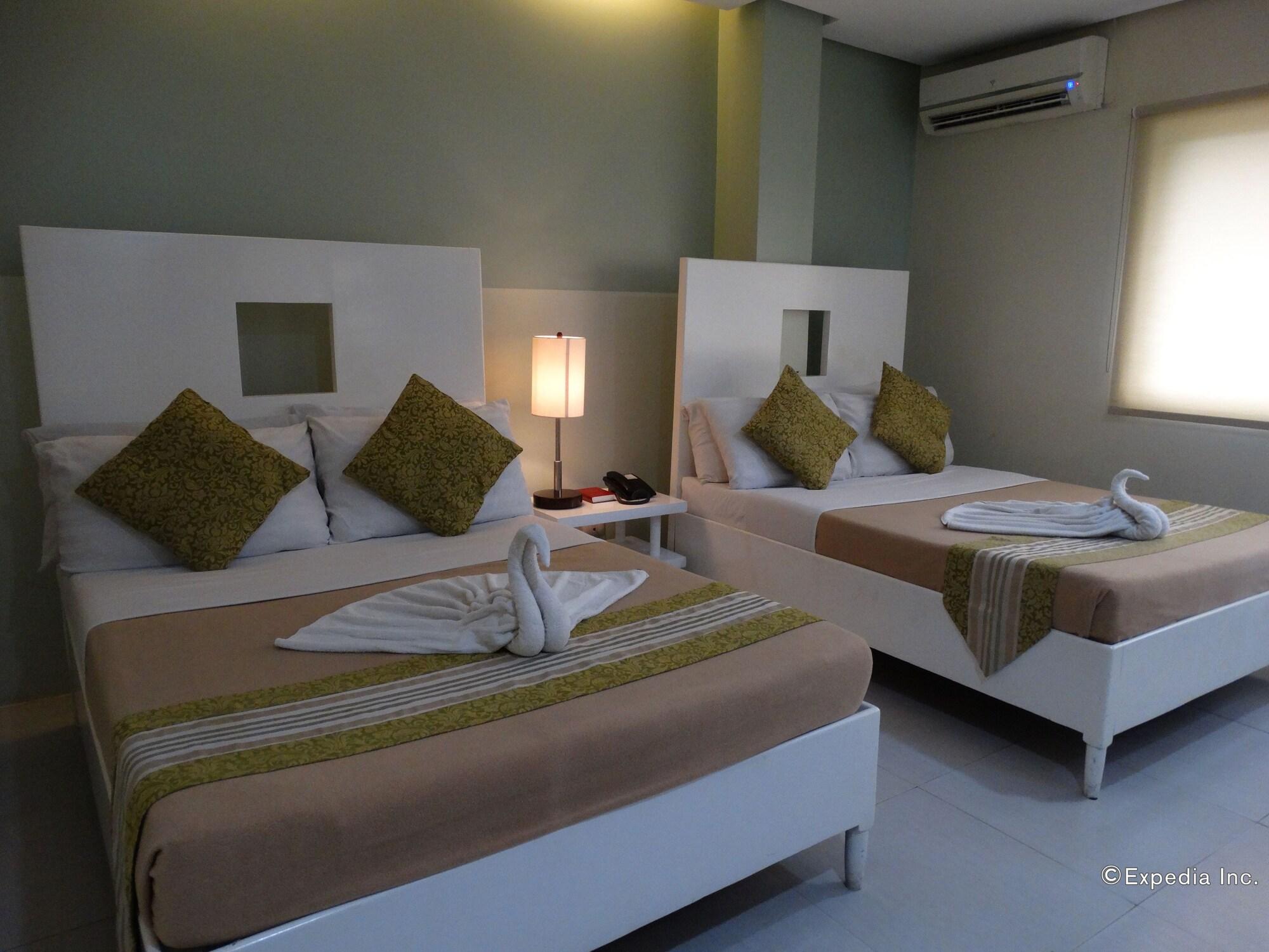 Empire Suites Hotel Puerto Princesa Luaran gambar