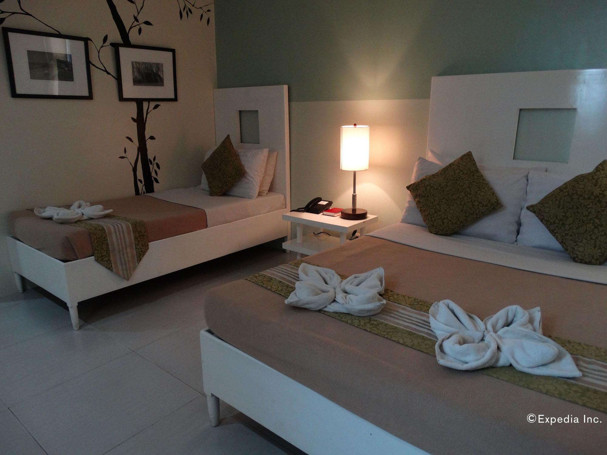 Empire Suites Hotel Puerto Princesa Luaran gambar