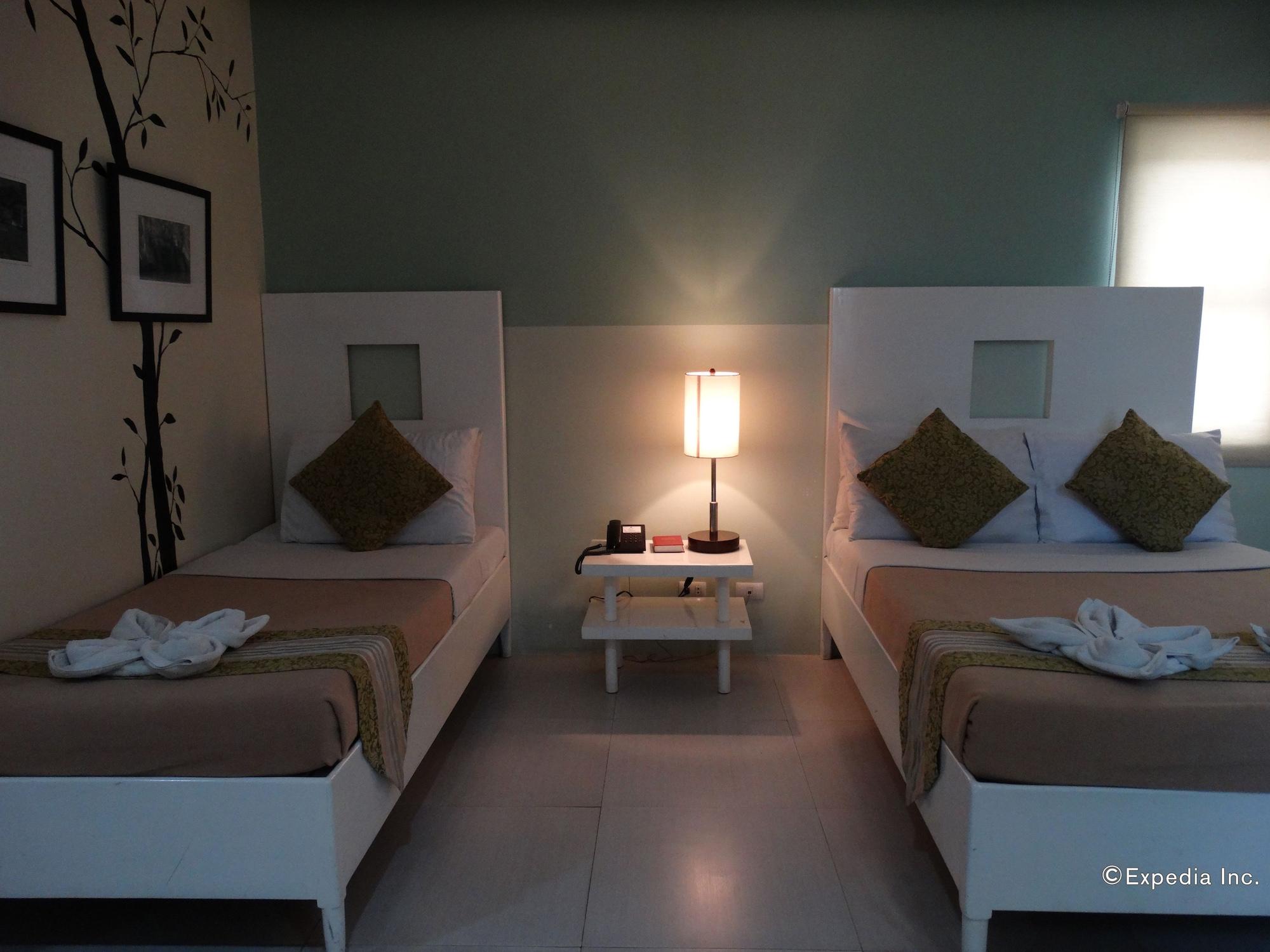 Empire Suites Hotel Puerto Princesa Luaran gambar