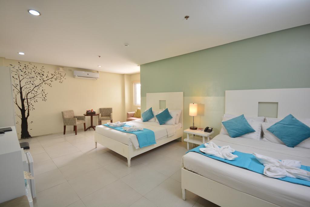 Empire Suites Hotel Puerto Princesa Luaran gambar